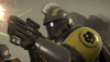 Helldivers 2 screenshot showing a heavily armoured Helldiver aiming a weapon.