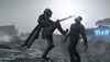 Helldivers 2 screenshot showing a Helldiver kicking an enemy